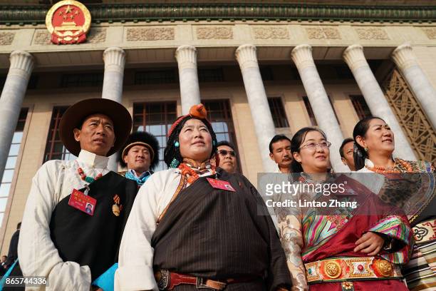 Representative of a minority ethnic group attend the closing of the 19th Communist Party Congress at the Great Hall of the People on October 24, 2017...