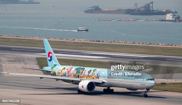 Boeing 777 passenger plane belonging to the Korean Air taxis down the runway at Hong Kong International Airport, on 23 October 2017, in Hong Kong,...