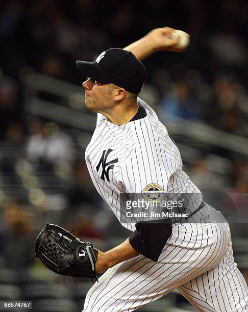 Alfredo Aceves of the New York Yankees deals a pitch against the Boston Red Sox on May 5, 2009 at Yankee Stadium in the Bronx borough of New York...