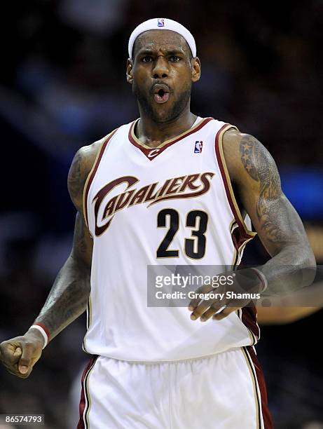LeBron James of the Cleveland Cavaliers reacts after just missing a three pointer as time expired in the third quarter while playing the Atlanta...