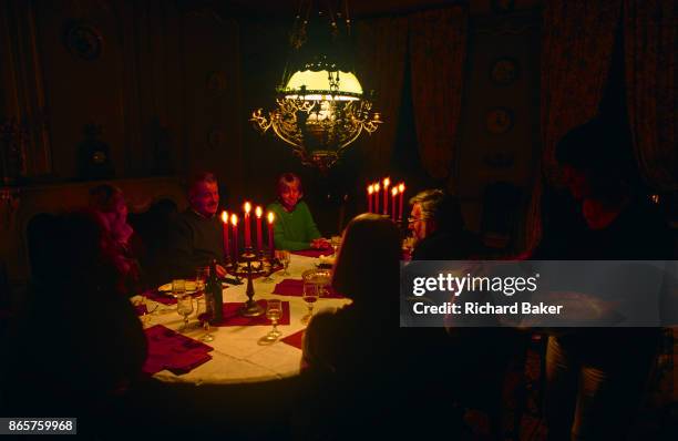 Evening dinner is served by candlelight in the Domaine de Rennebourg, a gite property in south-western rural France, on 15th October 1997, in...