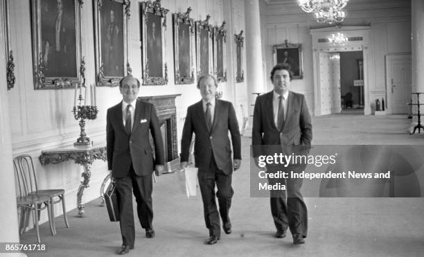 Charles Haughey, John Hume, and Gerry Collins at Dublin Castle on their way to the meeting of the New Ireland Forum, circa October 1983. .