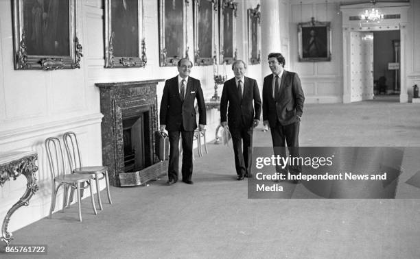 Charles Haughey, John Hume, and Gerry Collins at Dublin Castle on their way to the meeting of the New Ireland Forum, circa October 1983. .