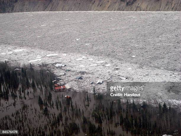 In this handout photo released by the Alaska State Troopers, houses and cabins are destroyed by ice and water as the Yukon River floods May 5, 2009...