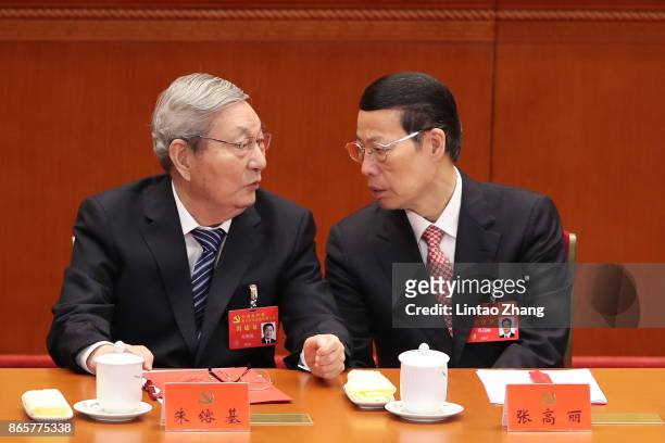 China's former Premier Zhu Rongji talk with Chinese Vice-Premier Zhang Gaoli duirng the closing of the 19th Communist Party Congress at the Great...