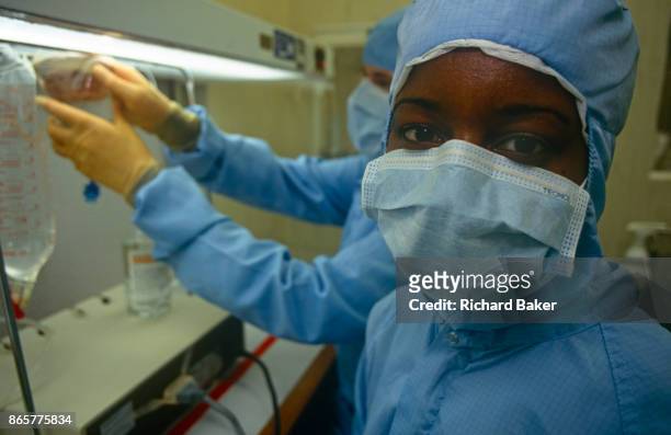 Portrait of a masked NHS technician, in the London Hospital, Whitechapel, on 23rd June 1993, in London, England.