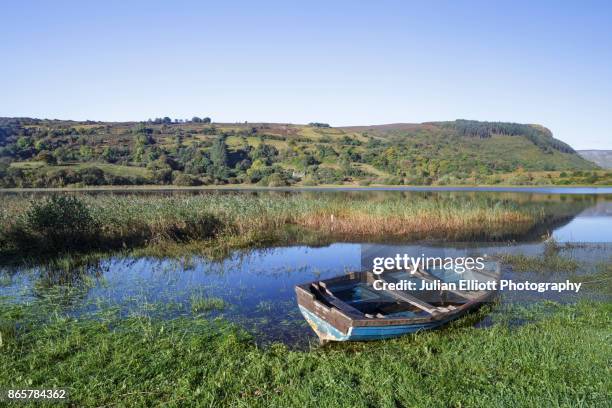 abandoned boat on glenade lough in county sligo, ireland. - county leitrim stock pictures, royalty-free photos & images