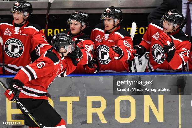 Etienne Verrette of the Quebec Remparts celebrates a goal with teammates in the first period against the Blainville-Boisbriand Armada during the...
