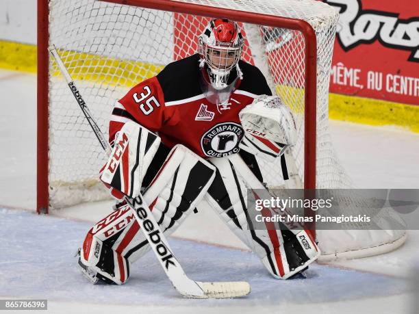 Olivier Chalifour of the Quebec Remparts protects his net against the Blainville-Boisbriand Armada during the QMJHL game at Centre d'Excellence...