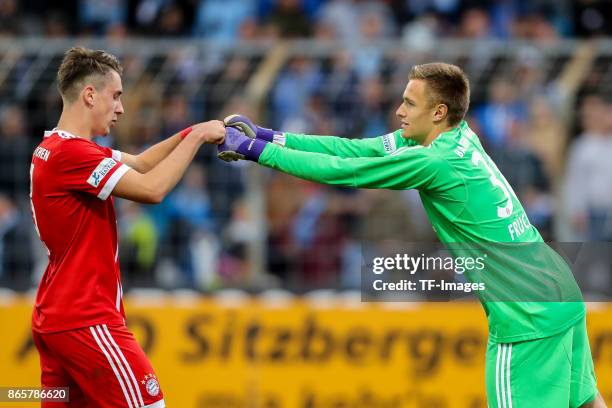 Adrian Fein of Bayern Muenchen and goalkeeper Christian Fruechtl of Bayern Muenchen celebrate their win during the match between TSV 1860 Muenchen...