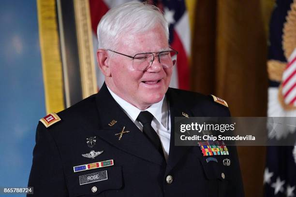 Retired U.S. Army Capt. Gary Rose laughs during his Medal of Honor ceremony in the East Room of the White House October 23, 2017 in Washington, DC....