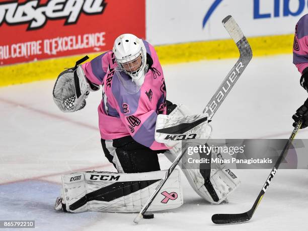 Goaltender Francis Leclerc of the Blainville-Boisbriand Armada tries to make a save as he is caught off guard against the Quebec Remparts during the...