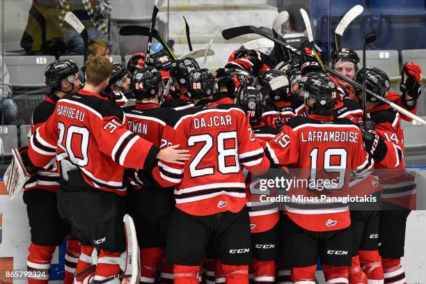 The Quebec Remparts celebrate their overtime victory against the Blainville-Boisbriand Armada during the QMJHL game at Centre d'Excellence Sports...