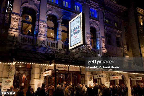 Theatre-goers outside the Noel Coward Theatre in St. Martin's Lane queue to see Labour of Love, a political comedy by James Graham and starring...