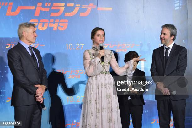 Ana de Armas makes a speech as she flanked by Harrison Ford and movie director Denis Villeneuve ahead of the Premiere of the movie Blade Runner 2049...