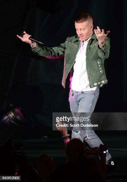 Rapper Macklemore performs onstage during the 5th annual "We Can Survive" benefit concert presented by CBS Radio at the Hollywood Bowl on October 21,...