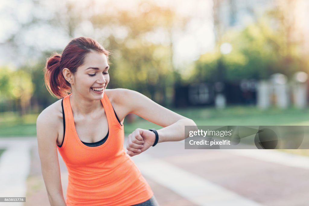 Athlete checking the smart watch