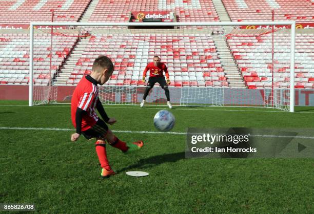 Sunderland keeper Mika faces fans in a penalty shoot out during a fans festival at The Stadium of Light on October 23, 2017 in Sunderland, England.