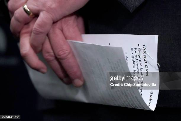 House Majority Leader Kevin McCarthy holds his notes before talking to reporters following the weekly House Republican Conference meeting at the U.S....