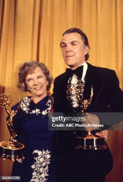 Ellen Corby and Anthony Zerbe holding their Emmy Awards in the press room at the 28th Annual Primetime Emmy Awards on May 17, 1976 at The Shubert...