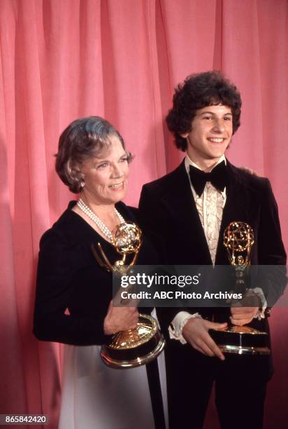 Actors Ellen Corby and Scott Jacoby hold their Emmy Awards in the press room at The 25th Primetime Emmy Awards on May 20, 1973 at Shubert Theatre,...