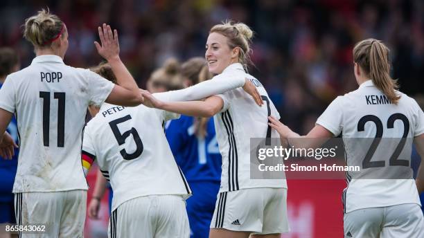 Babett Peter of Germany celebrates her goal with team mate Carolin Simon during the 2019 FIFA Women's World Championship Qualifier match between...