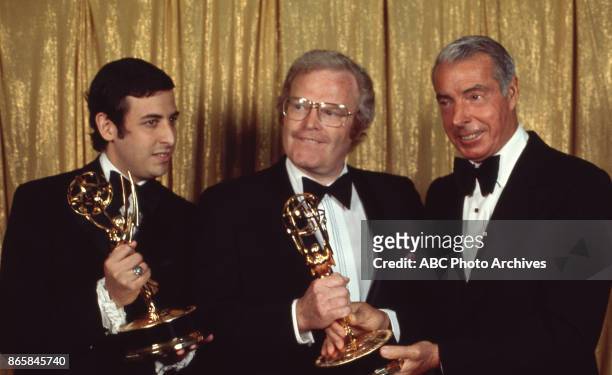 Dennis Lewin, Roone Arledge and Joe Dimaggio holding their Emmy Awards in the press room at The 24th Primetime Emmy Awards on May 6, 1972 at Pantages...