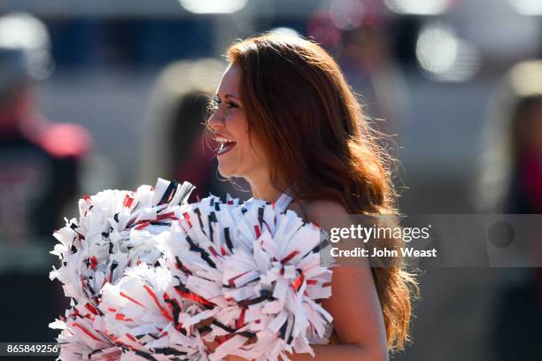 Texas Tech Red Raider cheerleader firing up the crowd before the game against the Iowa State Cyclones on October 21, 2017 at Jones AT&T Stadium in...