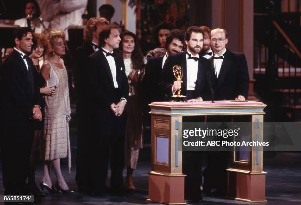 Marshall Herskovitz and Paul Haggis with Emmy Award. Cast members of Thirtysomething sanding behind them at The 40th Primetime Emmy Awards on August...