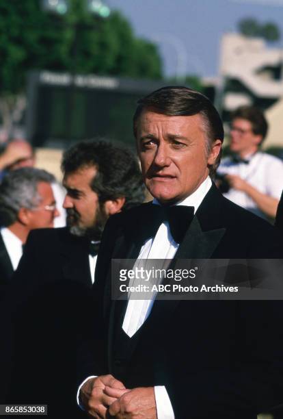 Robert Vaughn arrive at The 37th Primetime Emmy Awards on September22, 1985 at Pasadena Civic Auditorium, Pasadena, California.
