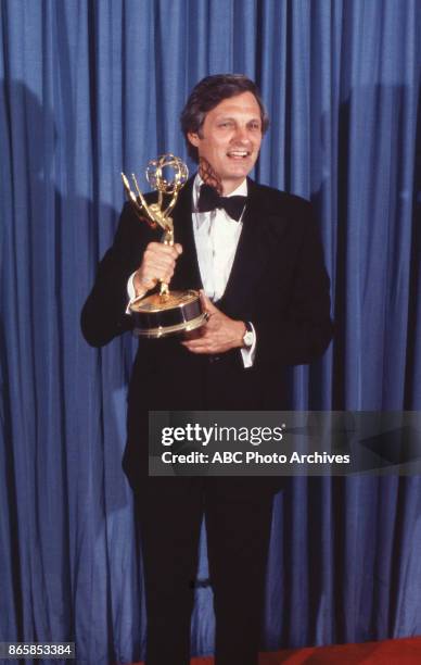 Alan Alda holding Emmy Award at The 31st Annual Primetime Emmy Awards on September 9, 1979 at the Pasadena Civic Auditorium, California