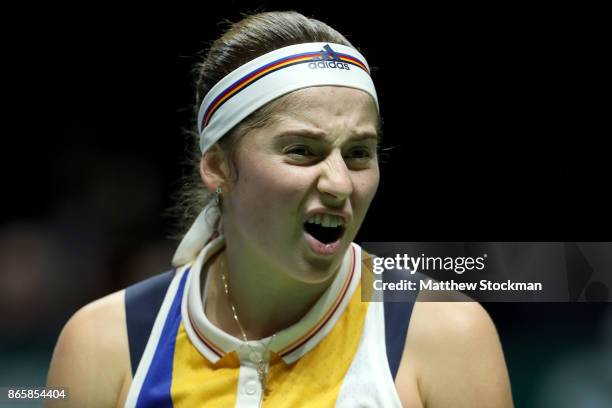 Jelena Ostapenko of Latvia reacts in her singles match against Venus Williams of the United States during day 3 of the BNP Paribas WTA Finals...