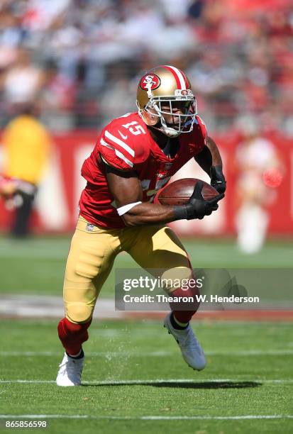 Pierre Garcon of the San Francisco 49ers runs with the ball after catching a pass against the Dallas Cowboys during their NFL football game at Levi's...