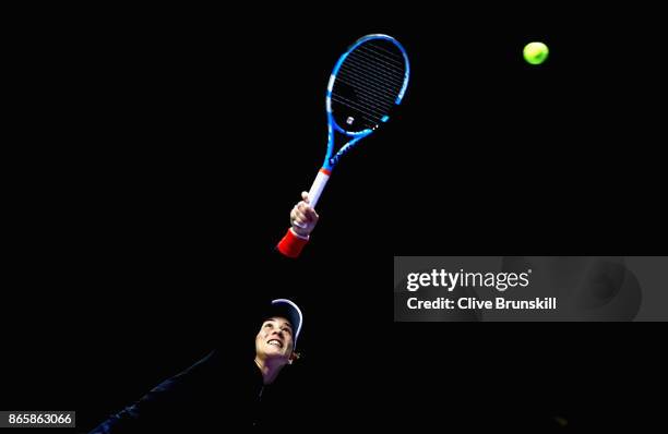 Garbine Muguruza of Spain serves in her singles match against Karolina Pliskova of Czech Republic during day 3 of the BNP Paribas WTA Finals...