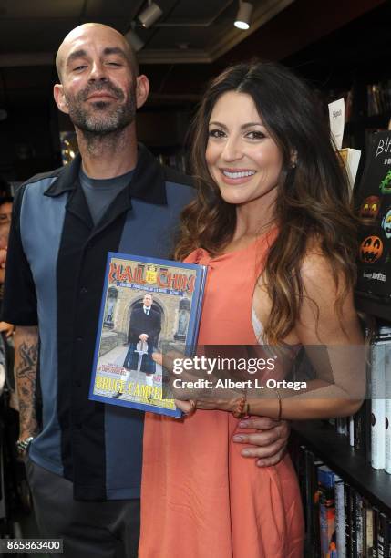 Actress Cerina Vincent and Mike Estes at Bruce Campbell's book signing for "Hail To The Chin" held at Dark Delicacies Bookstore on October 23, 2017...