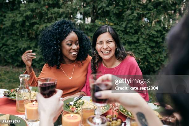 dinner with friends - canada wine stock pictures, royalty-free photos & images