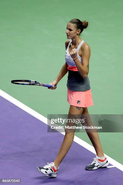 Karolina Pliskova of Czech Republic celebrates victory in her singles match against Garbine Muguruza of Spain during day 3 of the BNP Paribas WTA...