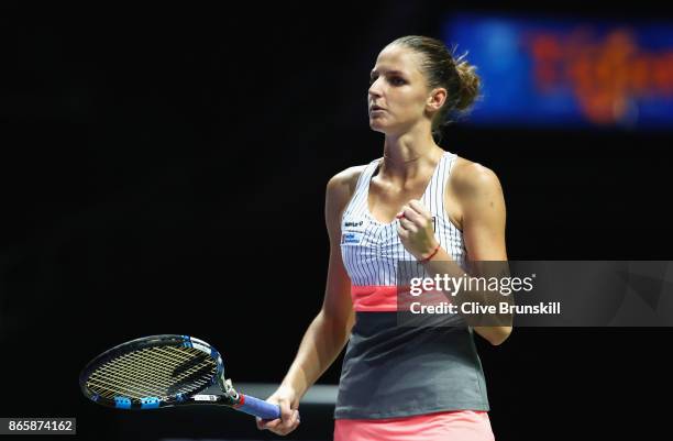 Karolina Pliskova of Czech Republic celebrates victory in her singles match against Garbine Muguruza of Spain during day 3 of the BNP Paribas WTA...