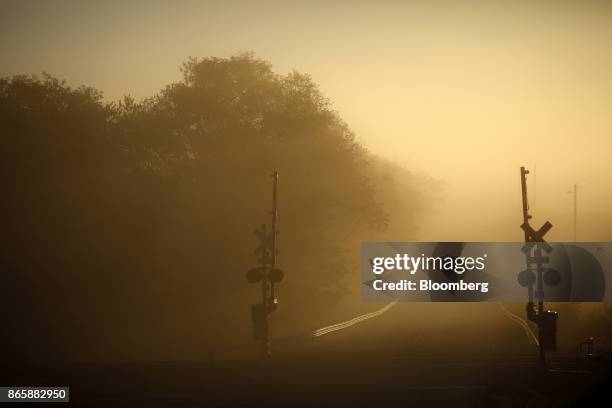 Norfolk Southern Corp. Railroad crossing gates stand in Danville, Kentucky, U.S., on Tuesday, Oct. 17, 2017. Norfolk Southern Corp. Is scheduled to...