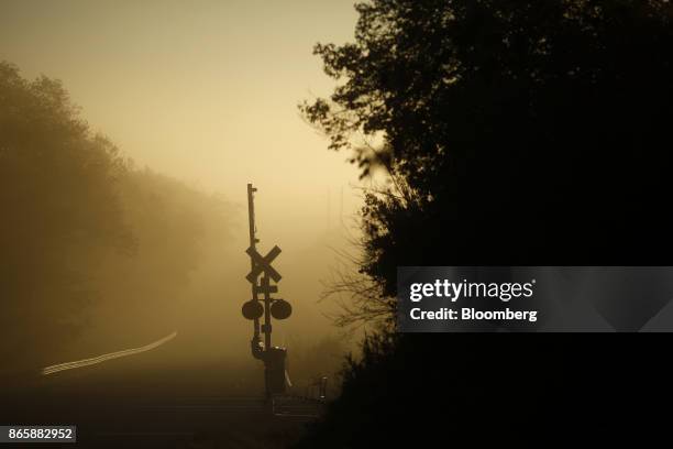 Norfolk Southern Corp. Railroad crossing gate stands in Danville, Kentucky, U.S., on Tuesday, Oct. 17, 2017. Norfolk Southern Corp. Is scheduled to...