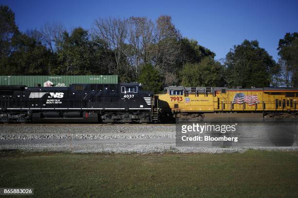 Norfolk Southern Corp., left, and Union Pacific Railroad Co. Freight locomotives sit parked in Burnside, Kentucky, U.S., on Tuesday, Oct. 17, 2017....