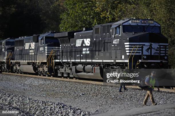 Conductors swap out during a crew change while Norfolk Southern Corp. Freight locomotives sit parked in Burnside, Kentucky, U.S., on Tuesday, Oct....