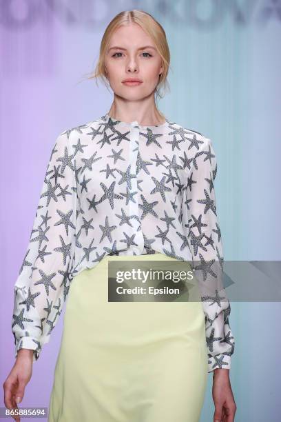 Model walks the runway at the KONDAKOVA fashion show during day four of Mercedes Benz Fashion Week Russia S/S 2018 at Manege on October 24, 2017 in...