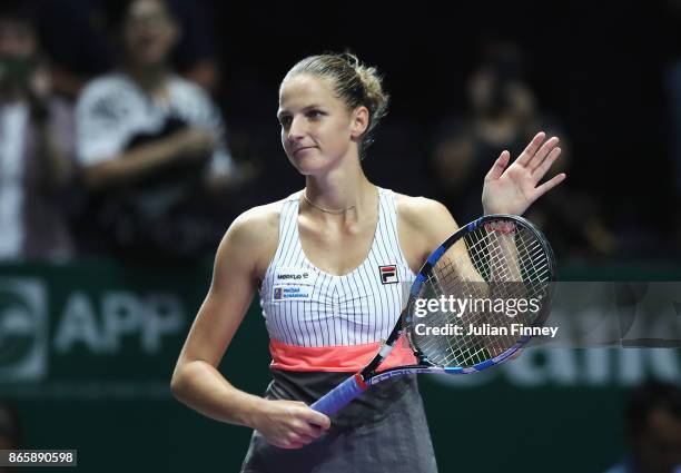 Karolina Pliskova of Czech Republic celebrates victory in her singles match against Garbine Muguruza of Spain during day 3 of the BNP Paribas WTA...