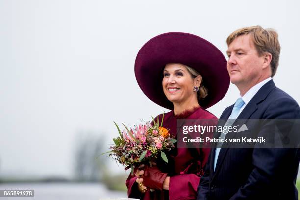 King Willem-Alexander of The Netherlands and Queen Maxima of The Netherlands visit water pomp system Gemaal Eemnes and sail with the ferry boat to...