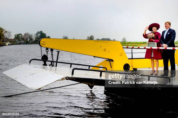 King Willem-Alexander of The Netherlands and Queen Maxima of The Netherlands visit water pomp system Gemaal Eemnes and sail with the ferry boat to...