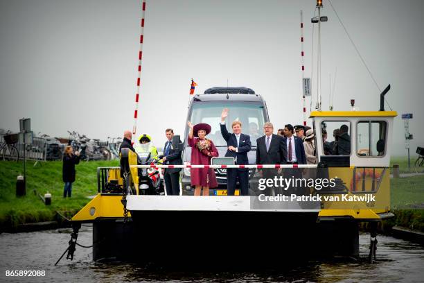 King Willem-Alexander of The Netherlands and Queen Maxima of The Netherlands visit water pomp system Gemaal Eemnes and sail with the ferry boat to...