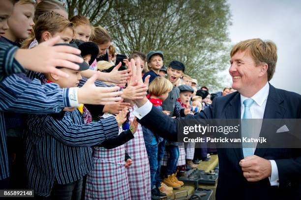 King Willem-Alexander of The Netherlands visits farm Het Gagelgat during there region visit to Eemland on October 24, 2017 in Eemdijk, Netherlands.