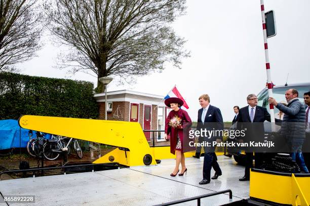 King Willem-Alexander of The Netherlands and Queen Maxima of The Netherlands visit water pomp system Gemaal Eemnes and sail with the ferry boat to...