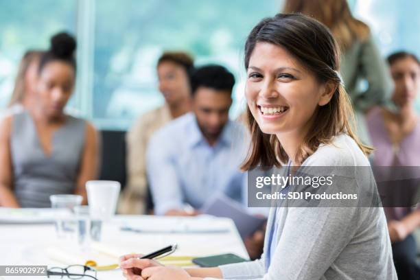 confident businesswoman attends seminar - mature student stock pictures, royalty-free photos & images